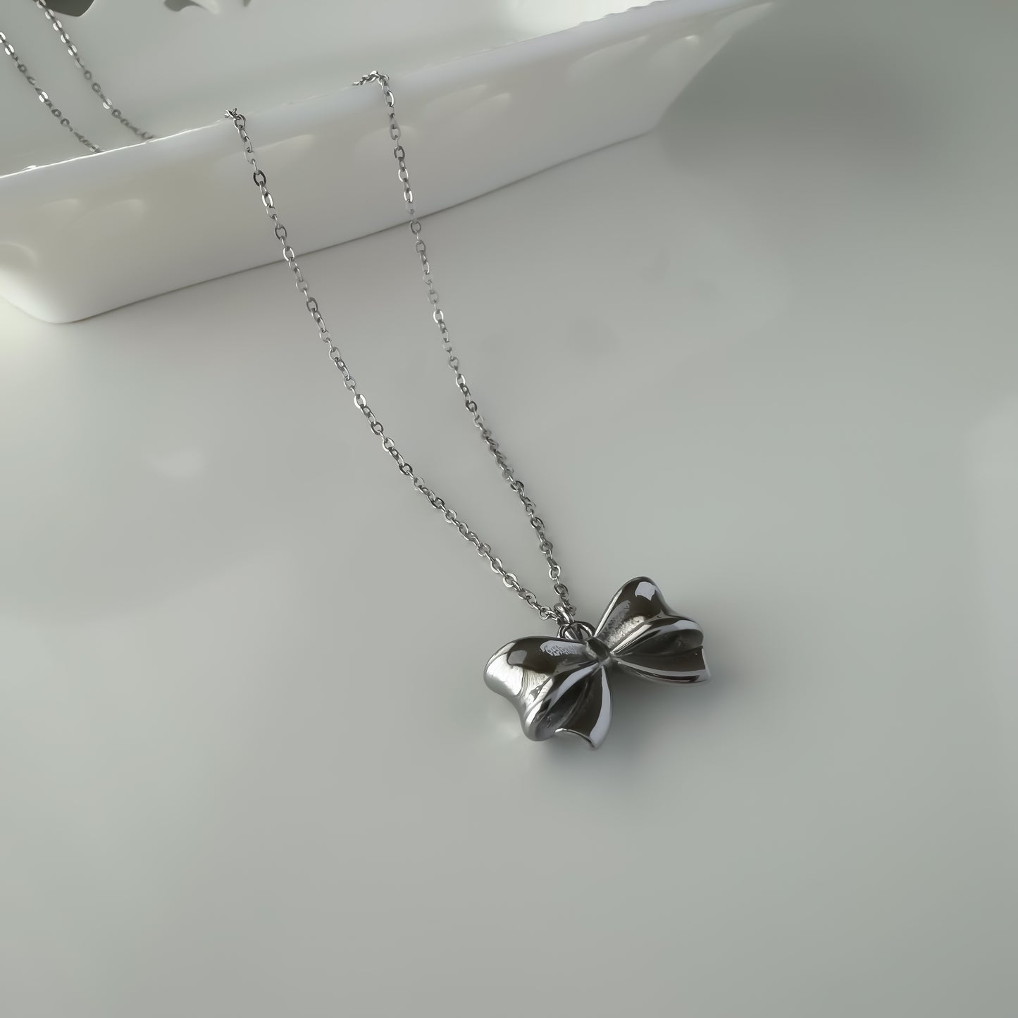 Bold bow ribbon pendant necklace