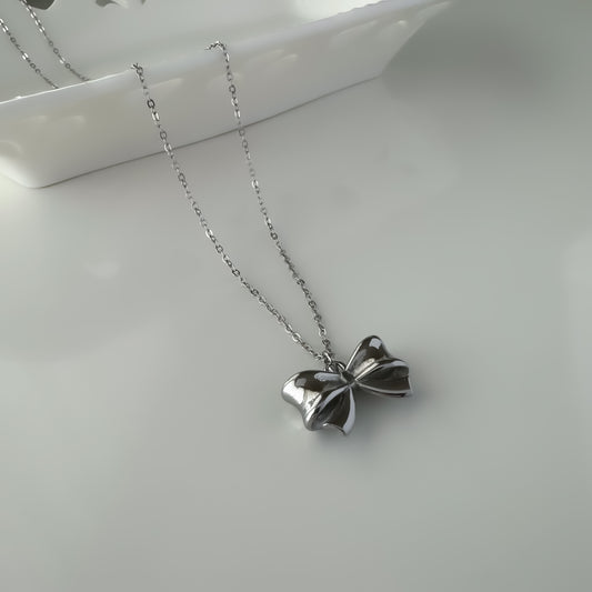 Bold bow ribbon pendant necklace